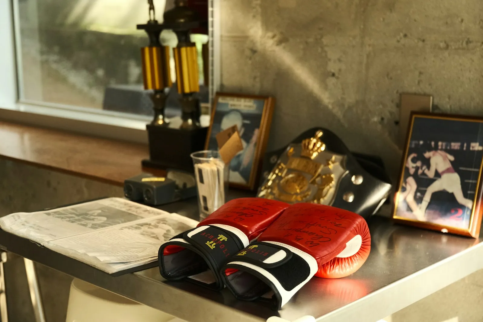 Signed boxing gloves, championship belt and framed fight photos, memorabilia framing Art Effects Southampton