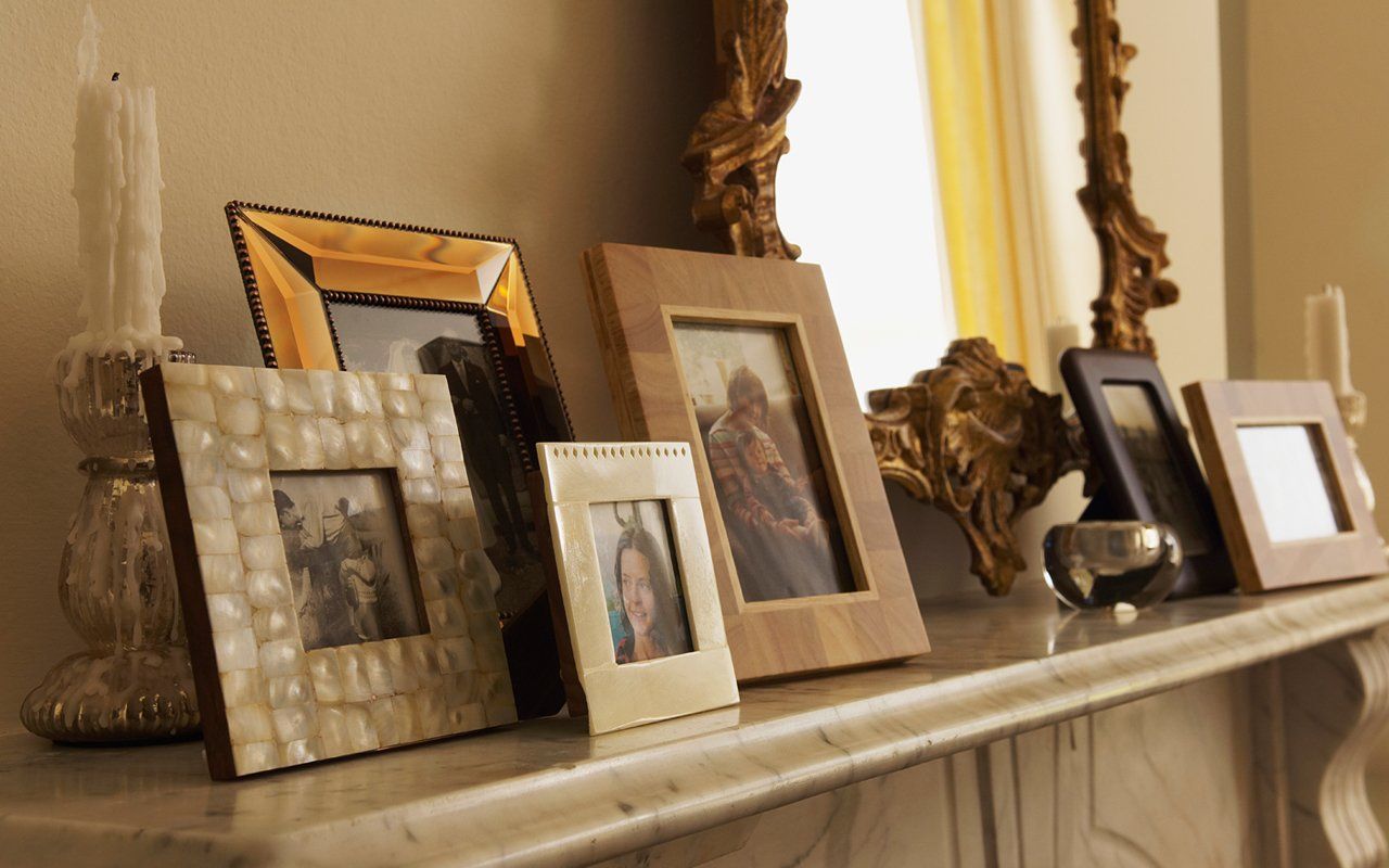 Picture frames on a mantelpiece, bespoke framing from Art Effects Southampton